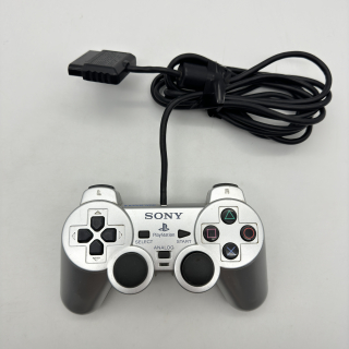 Playstation 2 ovládač (strieborný, popraskaný)